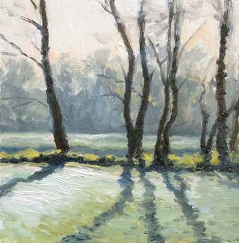 Plein air impressionist realist landscape oil painting of a frosty morning in Orleans gardens Twickenham.  The bright frosty morning created strong tree shadows across the grass, bright sunlight shining through hazy distant trees.