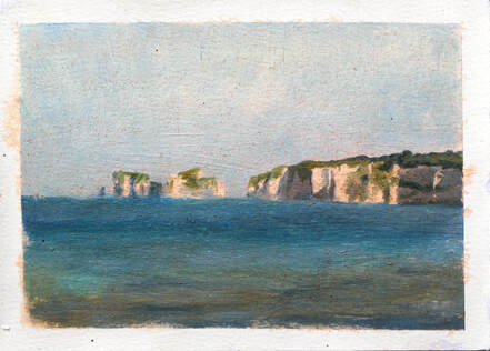 Impressionist realist plein air landscape painting of Old Harry Rocks from Studland Bay, Dorset.  Oil painting by Rosemary Lewis. Blue green sea and Chalk cliffs in the late afternoon sunlight.